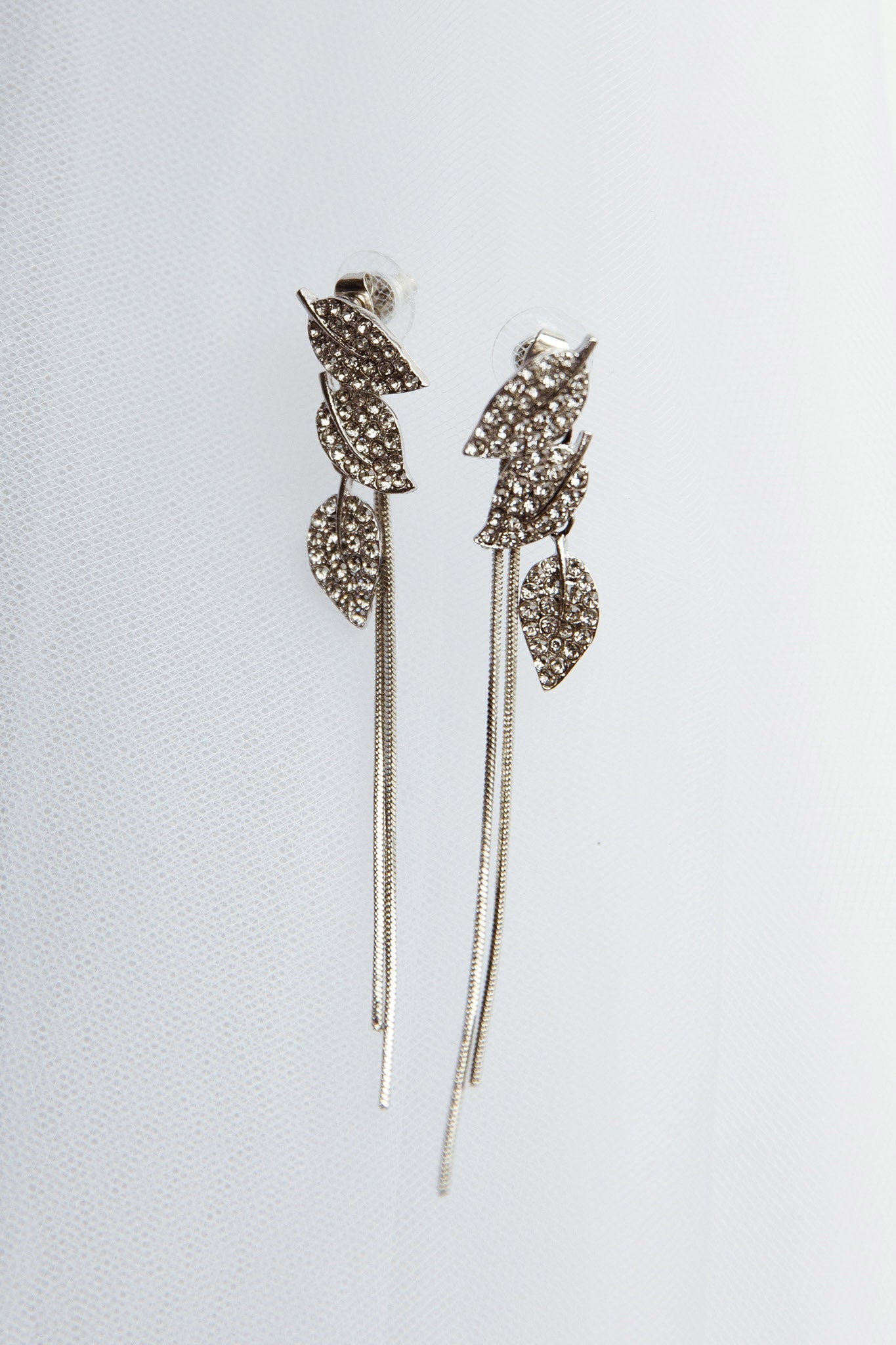 Silver zircon leaf-shaped dangling earrings