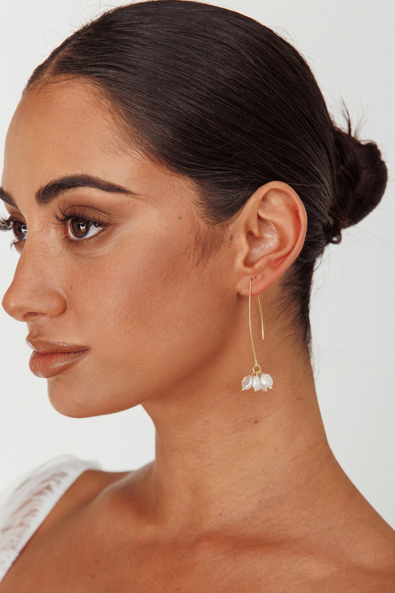 Long Hook Earrings with Golden Pearl Accents