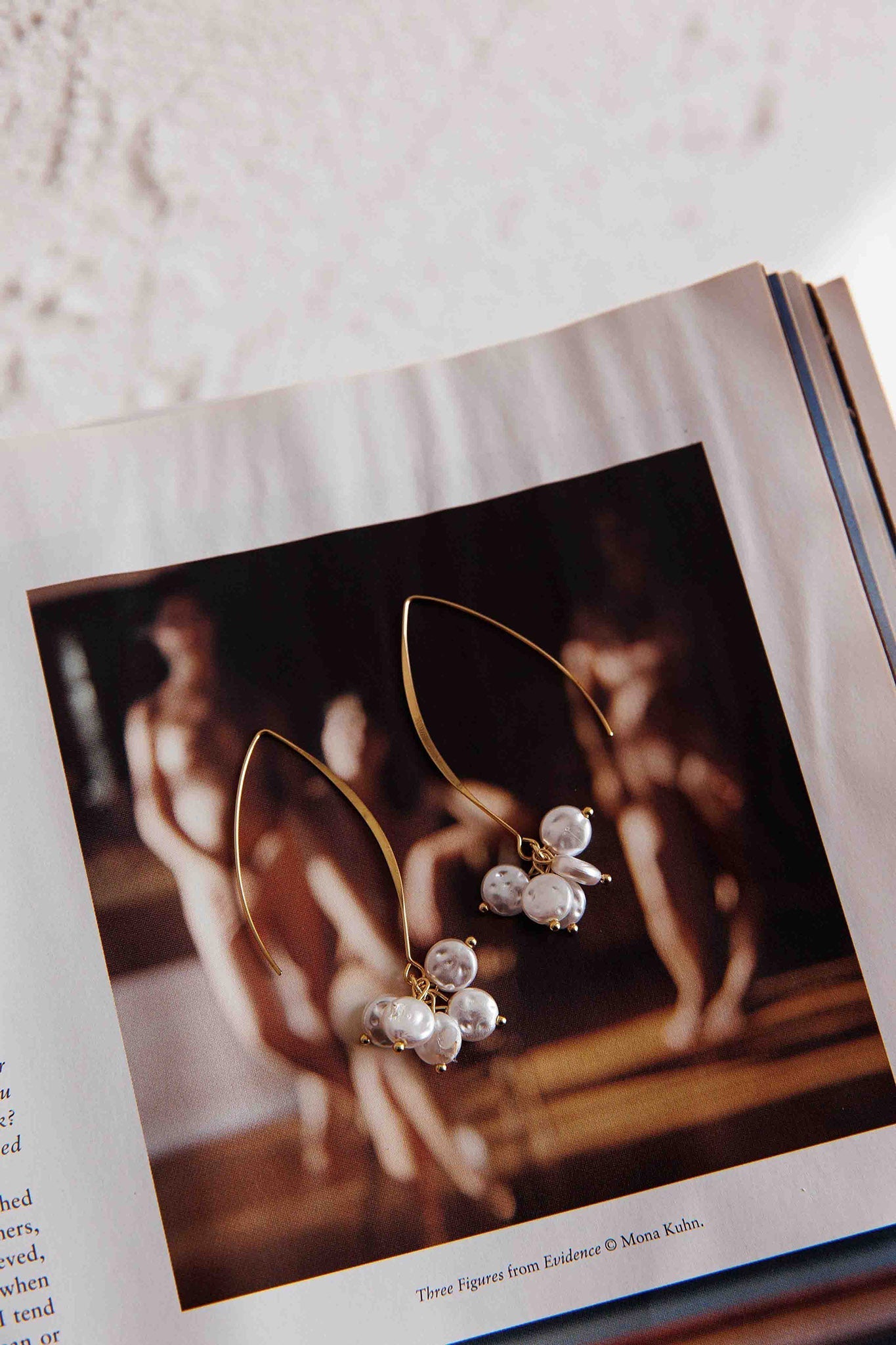 Long Hook Earrings with Golden Pearl Accents