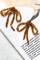 Flora Tan Pearl Knot Earrings